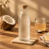 Eau de coco, boisson isotonique maison, eau enrichie : que valent les alternatives pour le sport